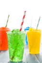 Colorful summer slushies on blue wood Royalty Free Stock Photo