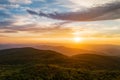 Summer sunset over mountain ridges Royalty Free Stock Photo