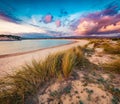 Colorful summer view of Voidokilia beach. Dramatic sunset on the Ionian Sea, Pilos town location, Greece, Europe. Beauty of nature Royalty Free Stock Photo