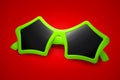 Colorful sunglasses with star shape on red background. Complementary color Royalty Free Stock Photo