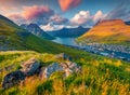 Colorful sunrise in Klaksvik town. Aerial summer view from populat tourist attraction - Klakkur peak, Faroe Islands, Denmark