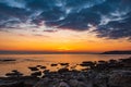 Colorful sunrise on the rocky sea coast Royalty Free Stock Photo