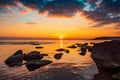 Colorful sunrise on the rocky sea coast Royalty Free Stock Photo