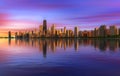 Colorful sunset above Chicago skyline across Lake Michigan Royalty Free Stock Photo