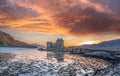 Colorful sunset against Eilean Donan Castle at Kyle of Lochalsh in the Western Highlands of Scotland Royalty Free Stock Photo