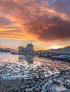 Colorful sunset against Eilean Donan Castle at Kyle of Lochalsh in the Western Highlands of Scotland Royalty Free Stock Photo