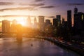 Colorful sunset behind the Brooklyn Bridge and skyscrapers of th Royalty Free Stock Photo