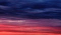 Colorful sunset with clouds in the evening. Abstract nature background. Dramatic and moody pink, purple and blue cloudy sunset sky Royalty Free Stock Photo