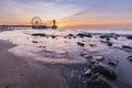 Colorful sunset on coastline, beach, pier and ferris wheel, Scheveningen, the Hague Royalty Free Stock Photo