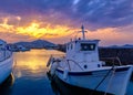 Colorful sunset in fishermen village and harbour. Royalty Free Stock Photo