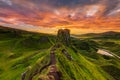 Colorful sunset on Isle of Skye to Castle Ewen rock
