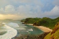 Colorful sunset at Merese Hill with a view of Tanjung Aan in Lombok, Indonesia Royalty Free Stock Photo