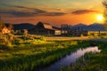 Colorful sunset over historic barn at Mormon Row in Grand Teton National Park