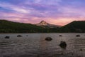 Colorful sunset over Hood Mountain from Laurance Lake in Oregon Royalty Free Stock Photo