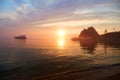 Colorful sunset over Lake Baikal. View of the Khuzhir Bay near the Shaman rock. Royalty Free Stock Photo