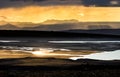 Colorful sunset over mountains, river and lake. Fantastic view. Iceland. Royalty Free Stock Photo