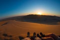 Colorful sunset over the Namib desert, Namibia, Africa. Scenic sand dunes in backlight in the Namib Naukluft National Park. Hiking Royalty Free Stock Photo