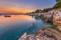 Colorful sunset over the rocky coast of Croatia Royalty Free Stock Photo