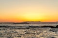 Colorful Sunset Over the Sea and Behind the Mountains of Greek Island Crete. Beautiful Colors in the Sky Royalty Free Stock Photo