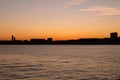 Colorful Sunset over a Silhouette of the Weehawken New Jersey Skyline along the Hudson River Royalty Free Stock Photo