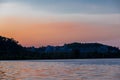 Colorful sunset over the Sint Pietersberg St Pieters mountain and a silhouette of the former cement factory and skyline near Maa Royalty Free Stock Photo