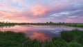 Colorful sunset over swamp and forest. Royalty Free Stock Photo