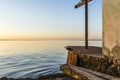 Colorful sunset over water surface, evening sun over the bay, summer sky without clouds Royalty Free Stock Photo