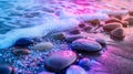 Colorful sunset on a pebble beach with gentle waves Royalty Free Stock Photo