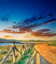 Colorful sunset by Porto Ferro shoreline Royalty Free Stock Photo