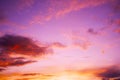 Colorful sunset. Purple red orange yellow sky with clouds. Beautiful evening sky background. Royalty Free Stock Photo