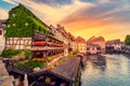 sunset in the region of Little France in the city of Strasbourg. Famous half-timbered houses, the river Ill and the Royalty Free Stock Photo