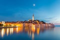 Colorful sunset of Rovinj town, Croatian fishing port on the west coast of the Istrian peninsula.