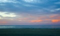 Colorful sunset sky with overcast clouds at Wharariki Beach, Nelson Royalty Free Stock Photo