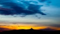 Colorful sunset sky panorama with silhouette of Jested Mountain Ridge, Liberec, Czech Republic