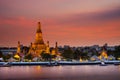 A colorful of sunset time reflection of gold pagoda `Wat Arun` Royalty Free Stock Photo