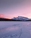 Colorful sunset at Twi Jack Lake, winter time, Banff National Park, Travel Alberta, Canada, Canadian Rockies, Rocky Mountains Royalty Free Stock Photo