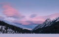 Colorful sunset at Twi Jack Lake, winter time, Banff National Park, Travel Alberta, Canada, Canadian Rockies, Rocky Mountains Royalty Free Stock Photo