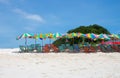 Colorful sunshade and chairs on beach