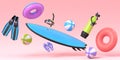 Colorful surfboard, beach ring, umbrellas and scuba mask on pink background.