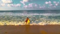 Colorful surfer in Sayulita beach Nayarit Royalty Free Stock Photo