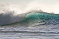 Colorful Surfing Wave Lit with sunlight in Pacific Ocean Royalty Free Stock Photo