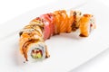 Colorful sushi roll with salmon, eel, tuna, avocado, cucumber, c Royalty Free Stock Photo