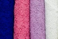 Colorful swatches of lace fabric on shopfront Royalty Free Stock Photo