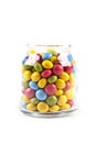 Colorful sweet candies in glass jar isolated on white Royalty Free Stock Photo