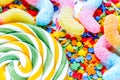 Sweets and sugar candies on abstract background pattern