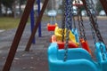 Colorful swings in children`s park