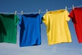 Colorful T-Shirts on blue sky Royalty Free Stock Photo