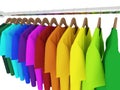 Colorful t-shirts with hangers isolated on white Royalty Free Stock Photo