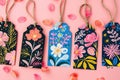 Colorful tags with floral patterns on pink background Royalty Free Stock Photo