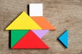 Colorful tangram puzzle in home shape wait for fulfill Royalty Free Stock Photo